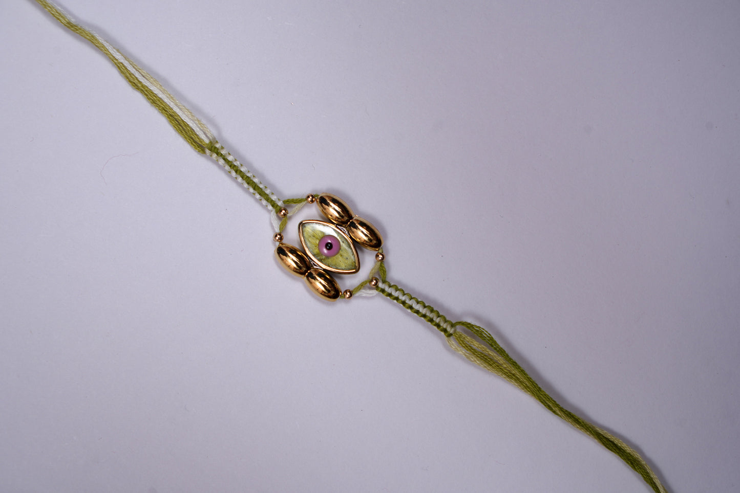 Green Evil Eye with Braided Thread Rakhi