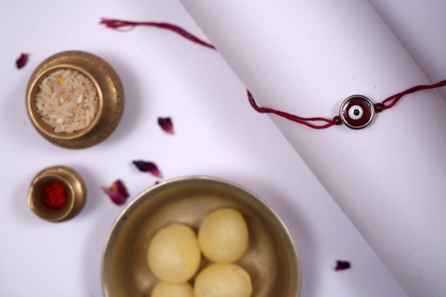 Maroon Evil Eye Charm Rakhi on Maroon Thread