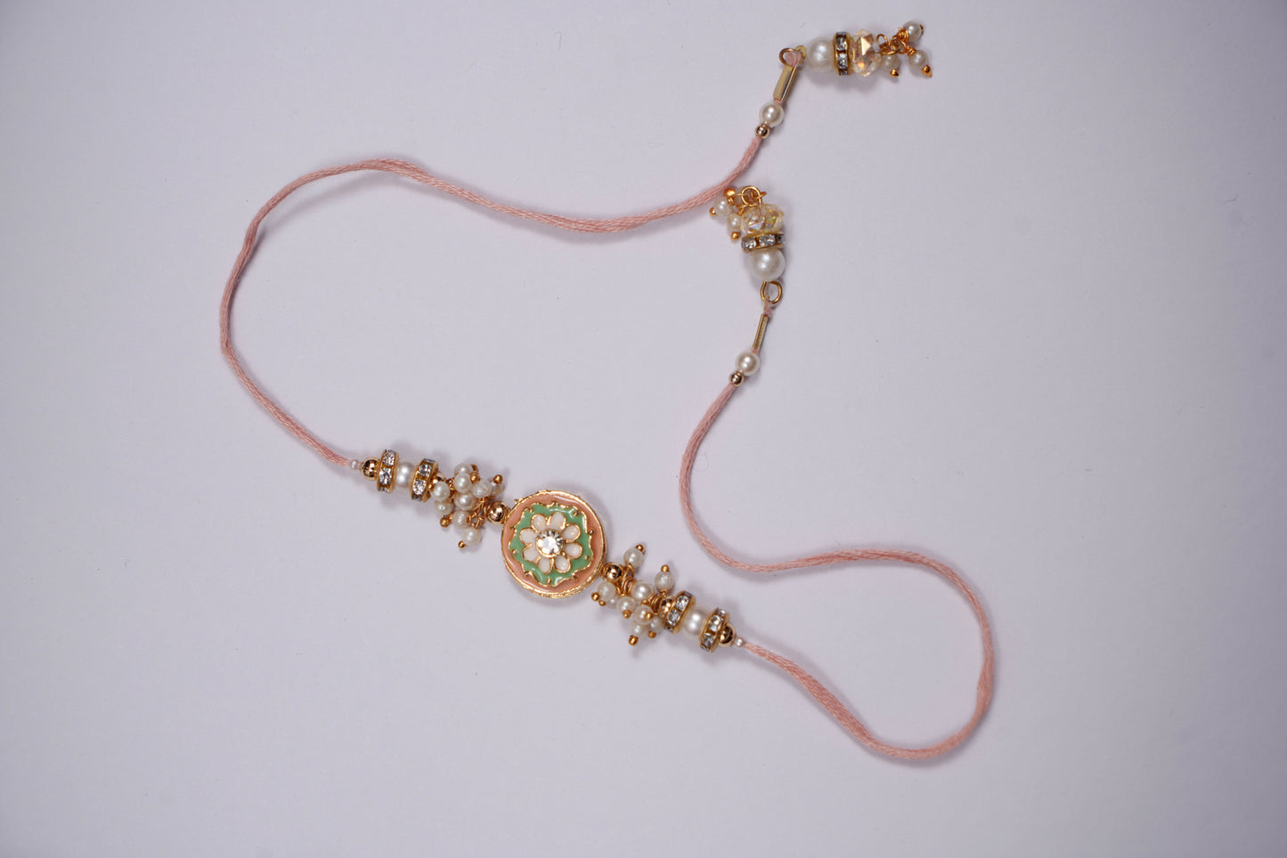 Peach Pearl Meenakari Kundan Rakhi