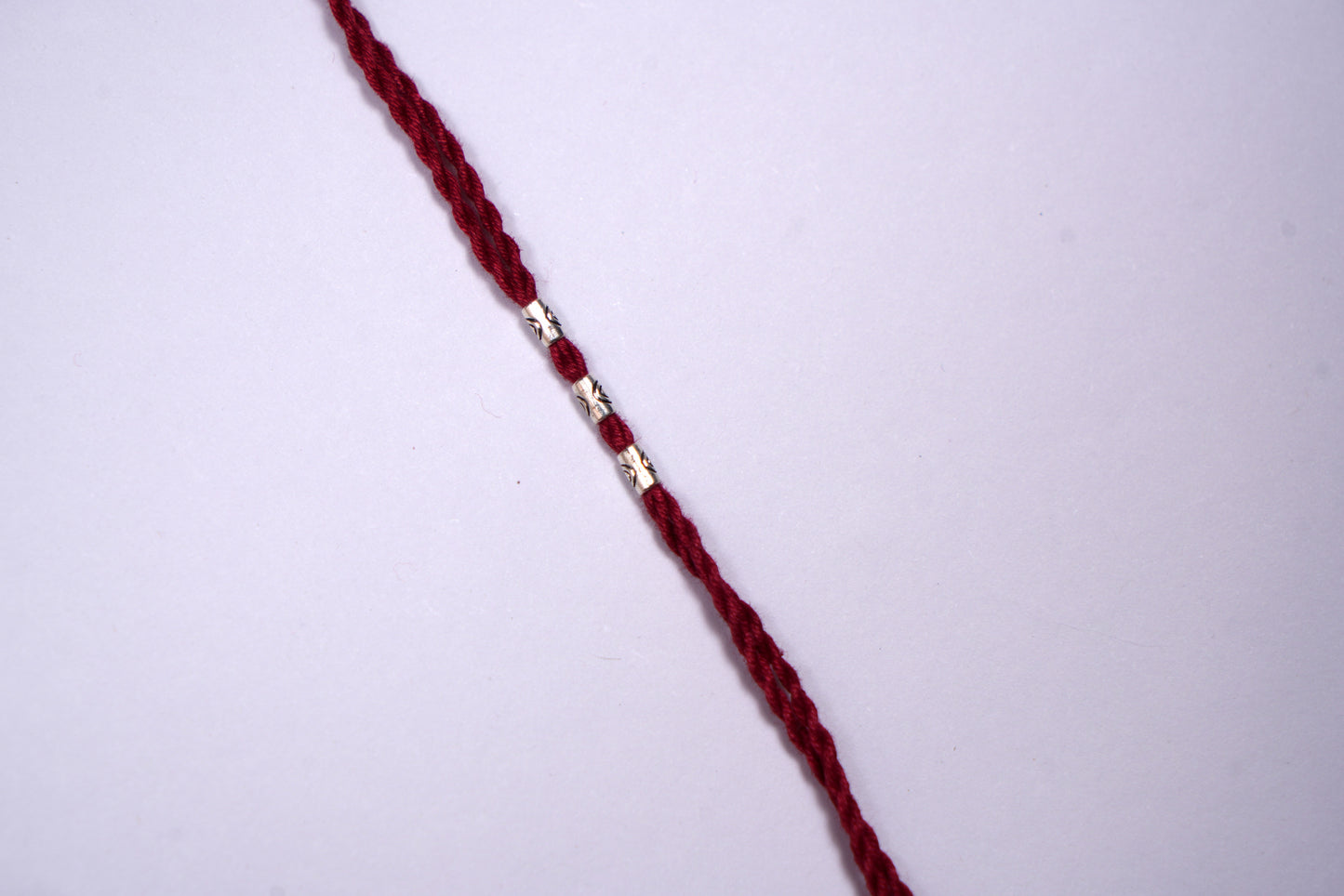 Silver Beads Braided Rakhi