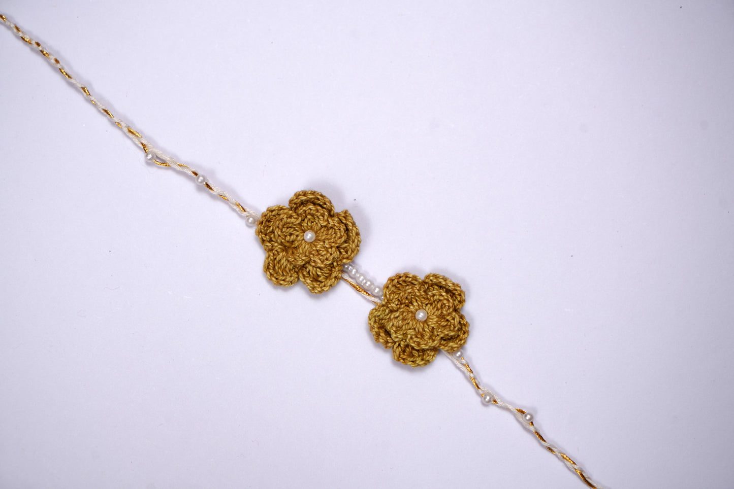 Double Flower Mustard Crochet Pearl Rakhi