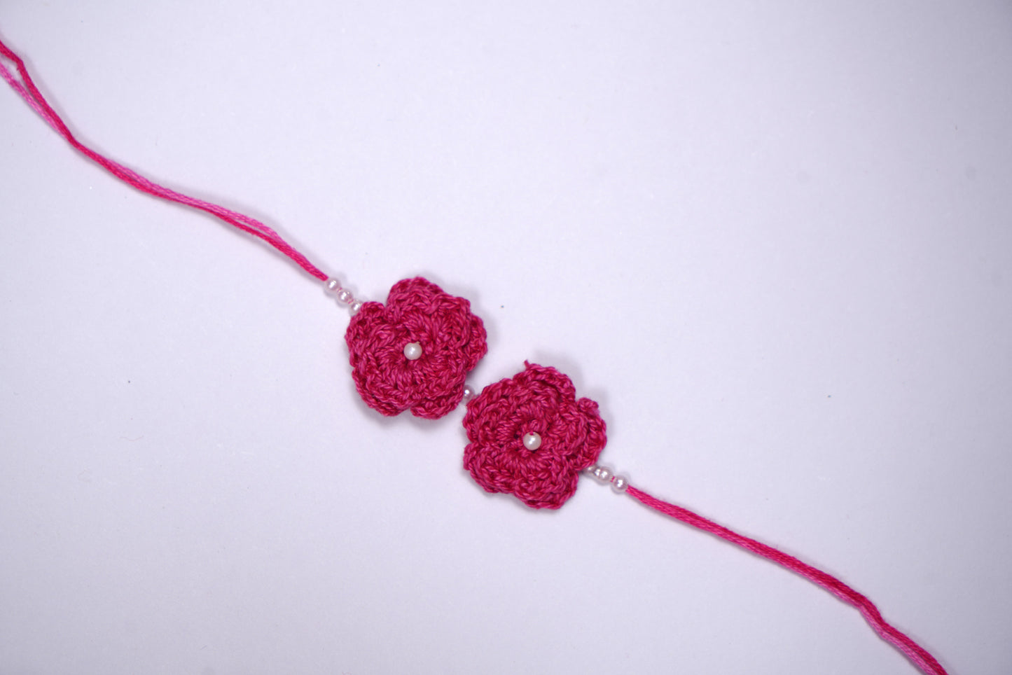 Double Flower Pink Crochet Pearl Rakhi