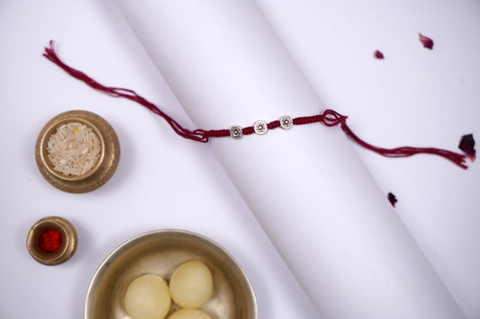 Silver Flower Rakhi with Braided Thread