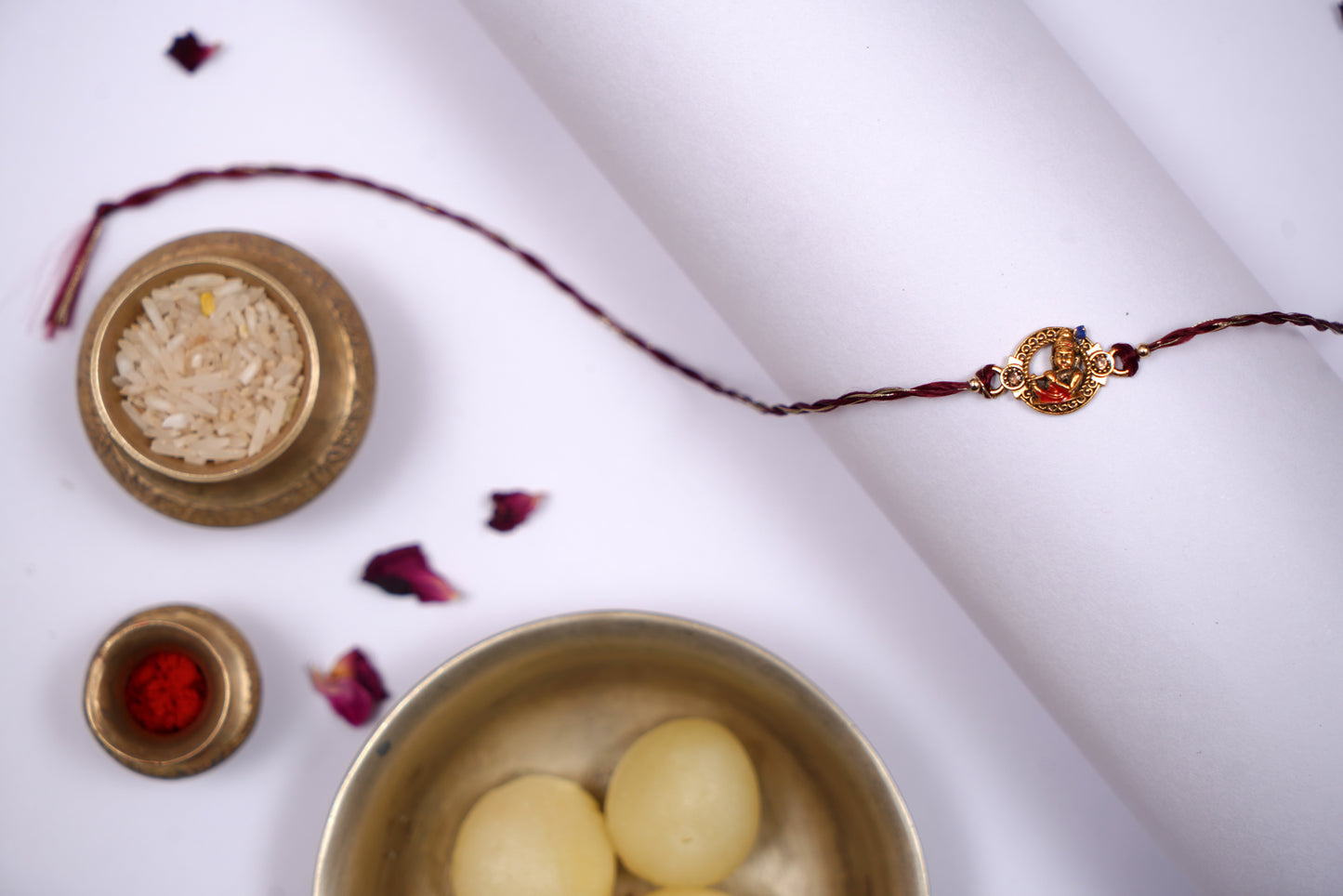 Golden Maroon twisted Silk Thread Rakhi with Kanha Charm