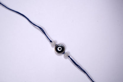 Blue Evil Eye Charm Rakhi on Blue Thread