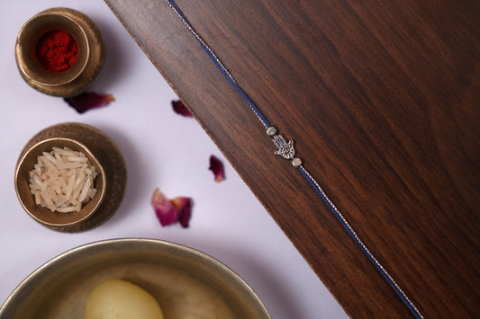 Evil Eye Rakhi with Silver Blue Thread