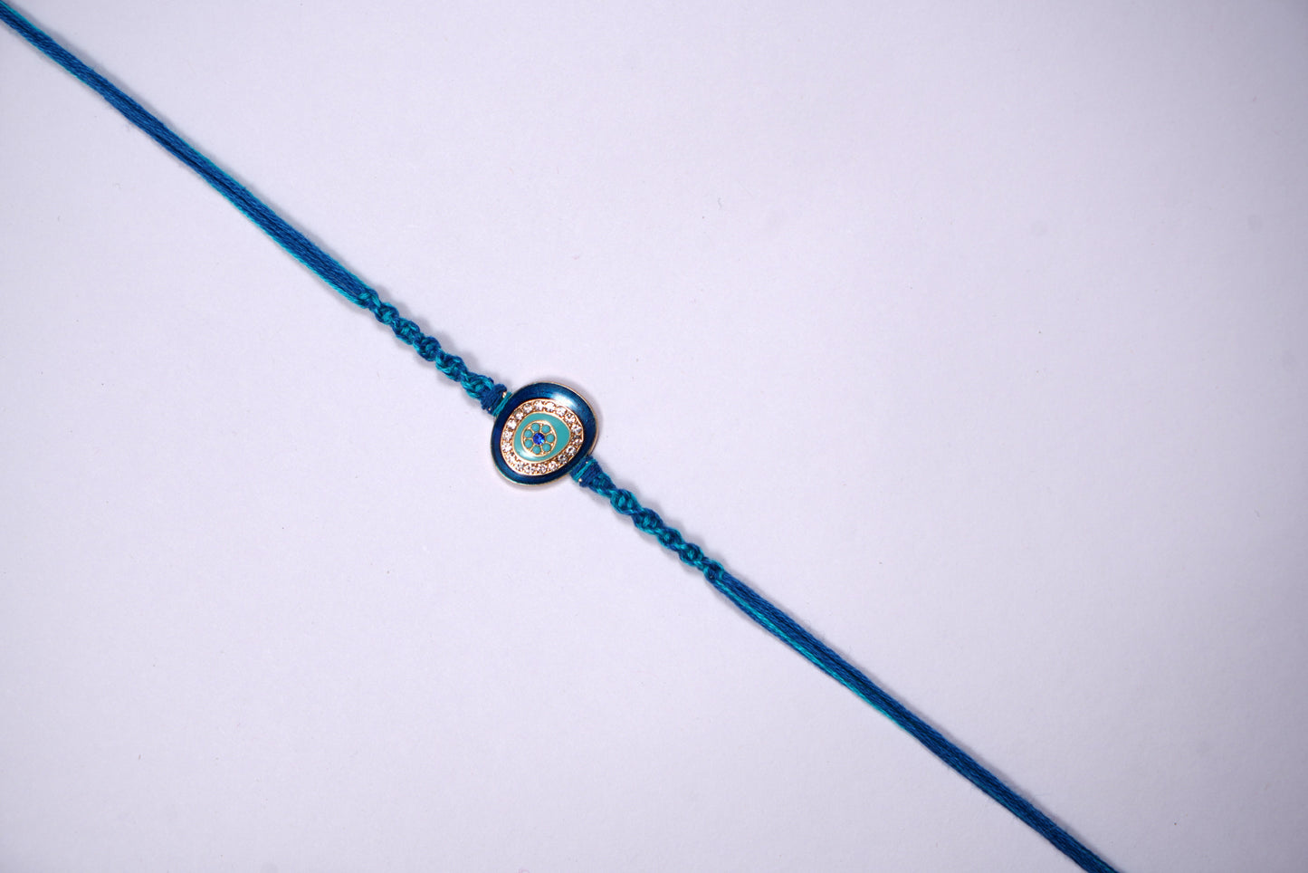 Blue Evil Eye Rakhi with Braided Thread