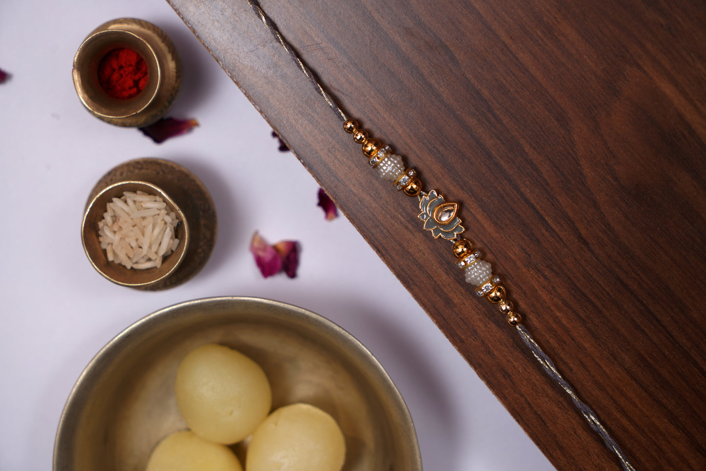 Grey Lotus Meenakari Motif Rakhi With Golden Grey Thread