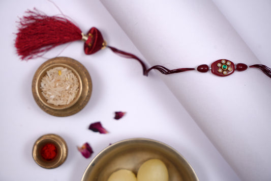 Tassel Kundan Studded Maroon Stone Rakhi