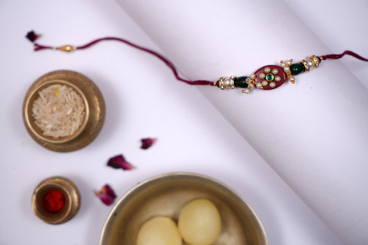 Pearl Studded Maroon Stone Rakhi