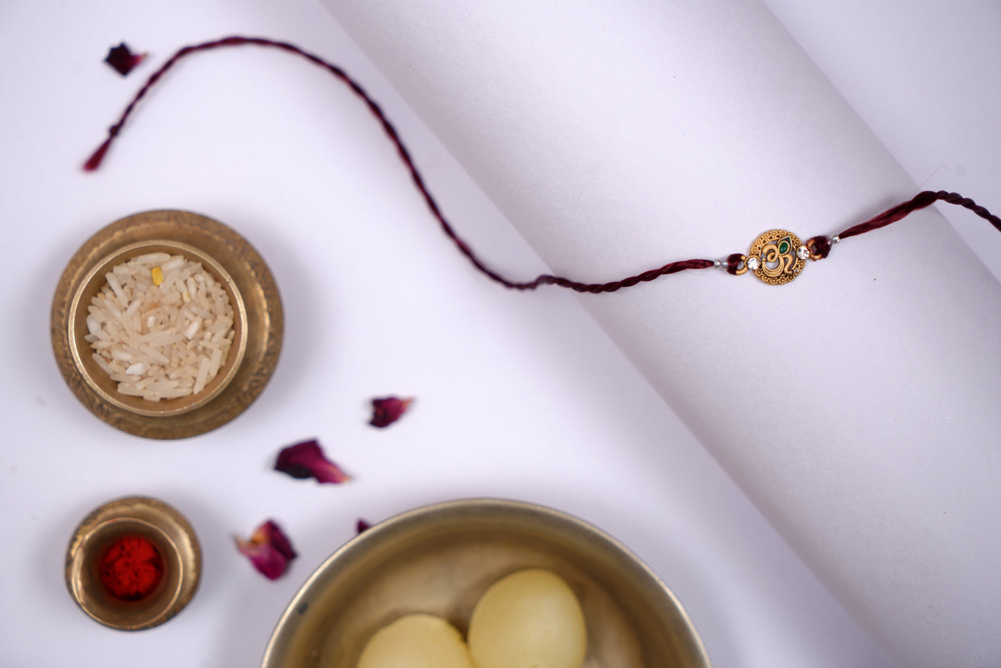 Maroon twisted Silk Thread Rakhi with Om Charm