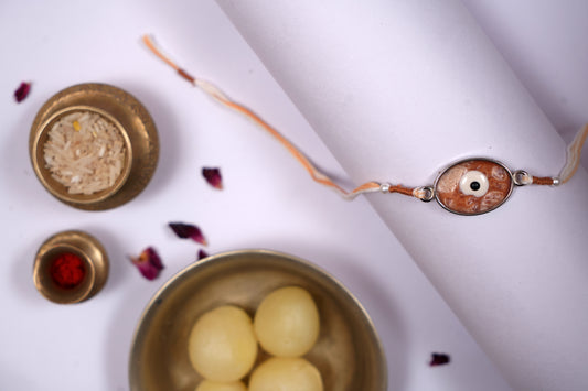 Orange Evil Eye Rakhi