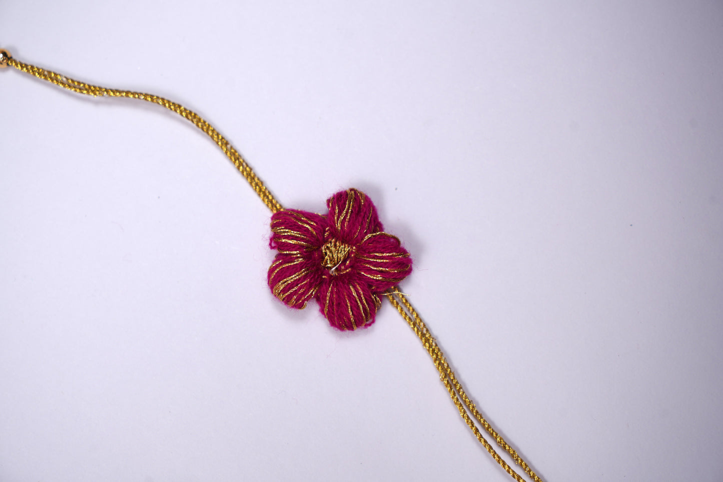 Pink Crochet Rakhi with Golden Thread