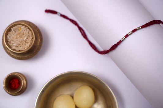 Silver Beads Braided Rakhi