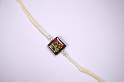 Multicolour Yellow Wooden Butterfly Rakhi